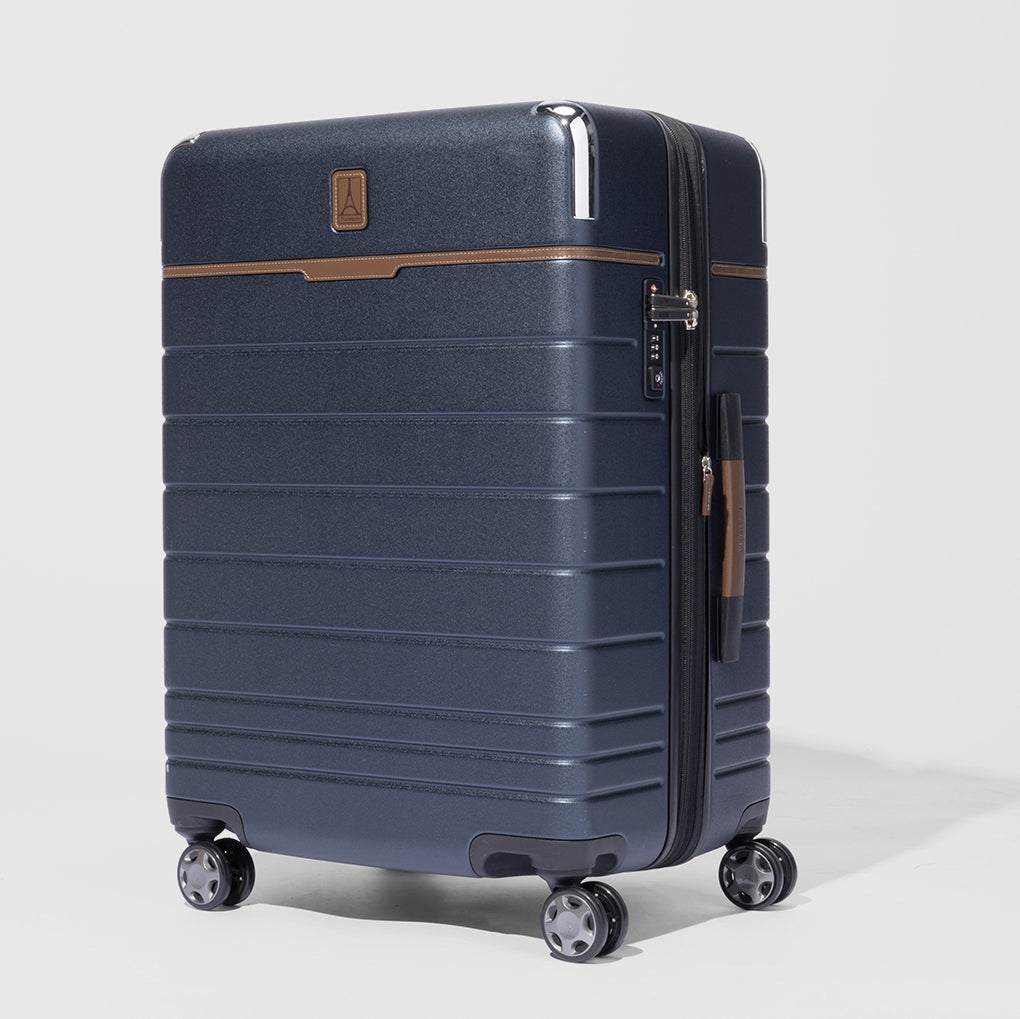 Blue suitcase with brown accents on a white background