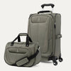 Green suitcase and tote with black handles and wheels on a white background