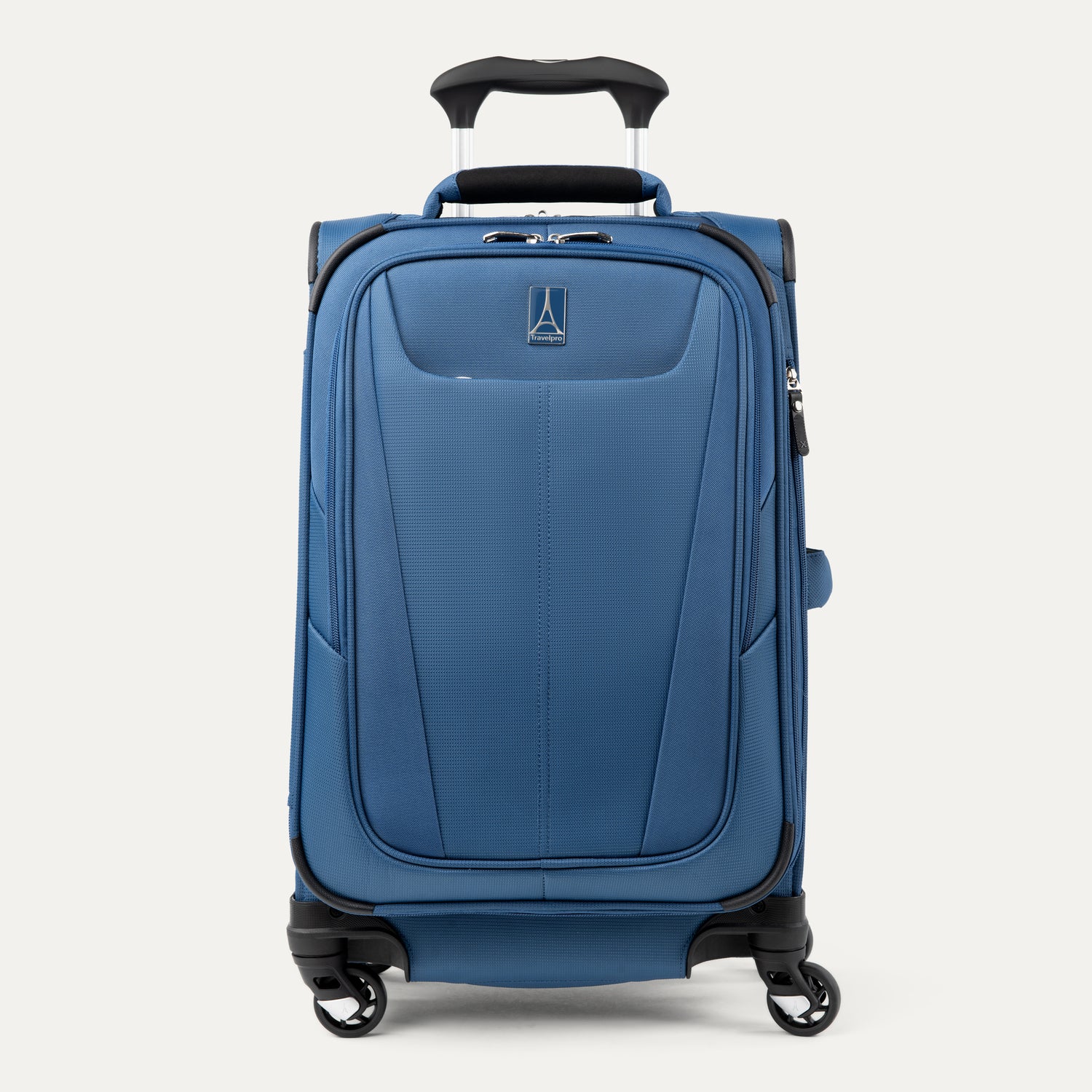 Front-facing Travelpro Maxlite 5 Carry-On Expandable Spinner in Ensign Blue, with curved zippered pocket and low-profile top carry handle.