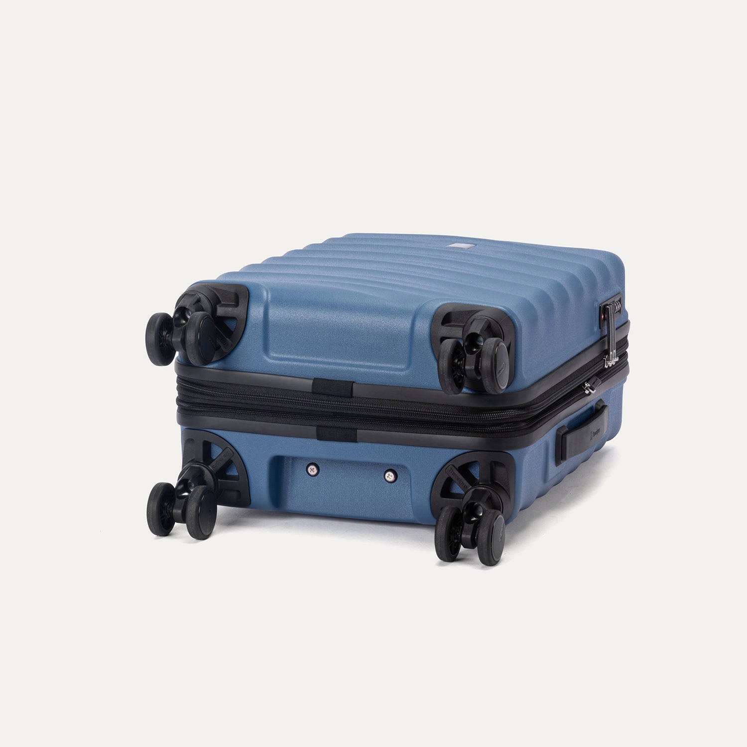 Bottom view of Travelpro Maxlite Air V2 Spinner in Ensign Blue, featuring 360° Spinner Wheels