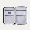 Interior view of Travelpro Maxlite Air V2 Spinner, featuring mesh zippered compartments for organized packing.