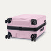 Bottom view of Travelpro Maxlite Air V2 Spinner in Orchid Pink, featuring dual spinner wheels and visible side carry handle.