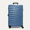 Front view of Travelpro Maxlite Air V2 Check-In Spinner in Ensign Blue, featuring a textured shell, integrated logo, top handle, and 360° spinner wheels.