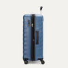 Side view of Travelpro Maxlite Air V2 Check-In Spinner in Ensign Blue, showing expandable zipper, Low-Profile Side Carry Handle, and extended PowerScope Lite Handle.