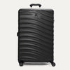 Front view of Travelpro Maxlite Air V2 Check-In Spinner in Black, featuring a textured shell, top handle, and 360° spinner wheels.