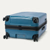 Bottom view of Travelpro Maxlite Air V2 Check-In Spinner in Teal, showing dual spinner wheels and side carry handle.