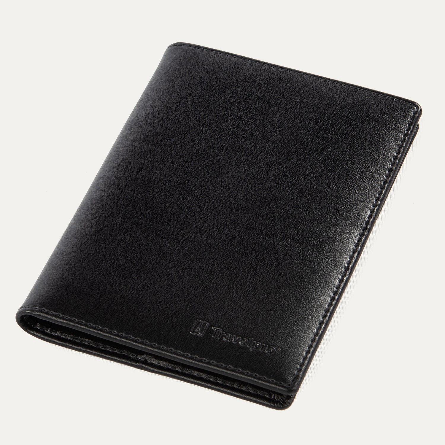 A black leather passport cover with the Travelpro brand logo visible on the lower side.