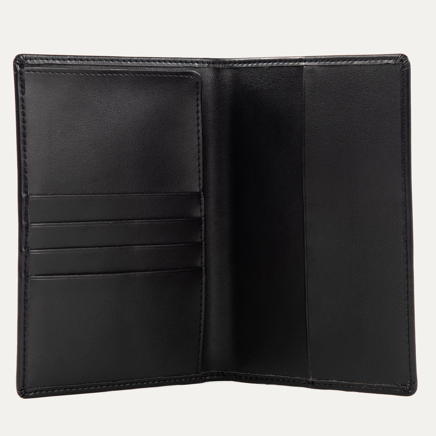 Interior view of a black Travelpro passport holder, featuring multiple card slots on the left and a large pocket on the right for securely holding a passport