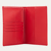 Interior view of a red Travelpro® passport cover, showing multiple card slots on the left and a larger pocket on the right for holding a passport.