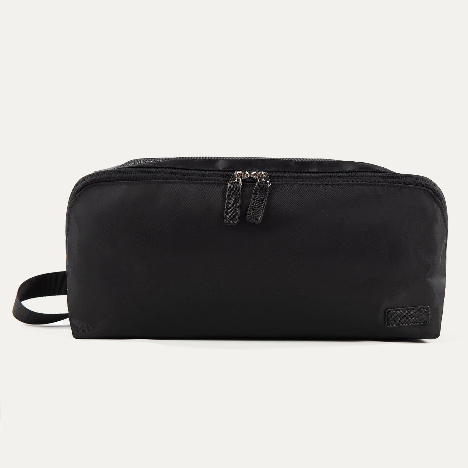 Front view of the Travelpro MaxAccess Cubes™ Large Shoe Organizer in black with dual zippers and a side handle.