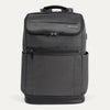 Front view of Travelpro Crew Executive Choice 3 Slim Backpack in Titanium Gray, featuring exterior quick-access pockets.