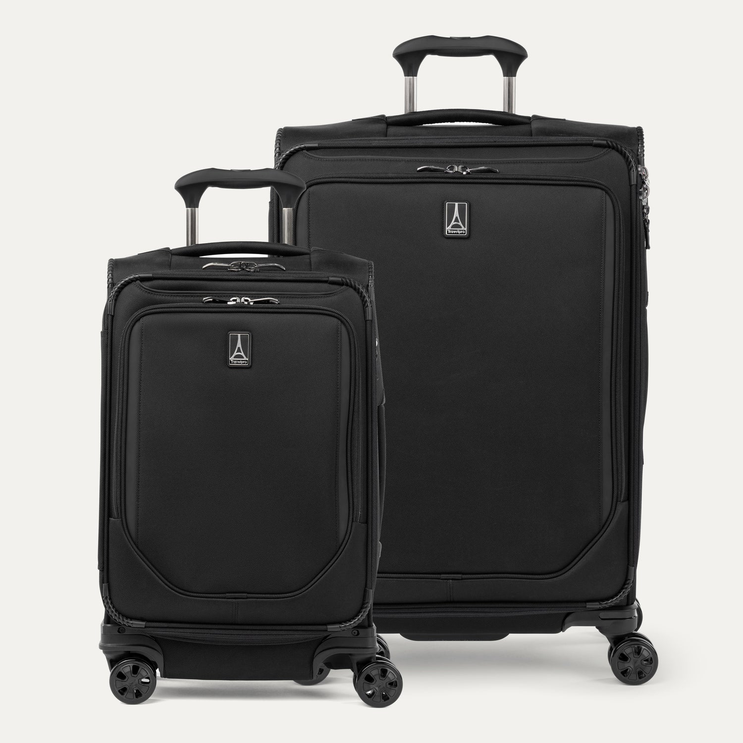 A set of two black travel spinner suitcases, one carry-on size and one medium check-in size, with a four-stop, height-adjustable PowerScope Handle and MagnaTrac wheels.