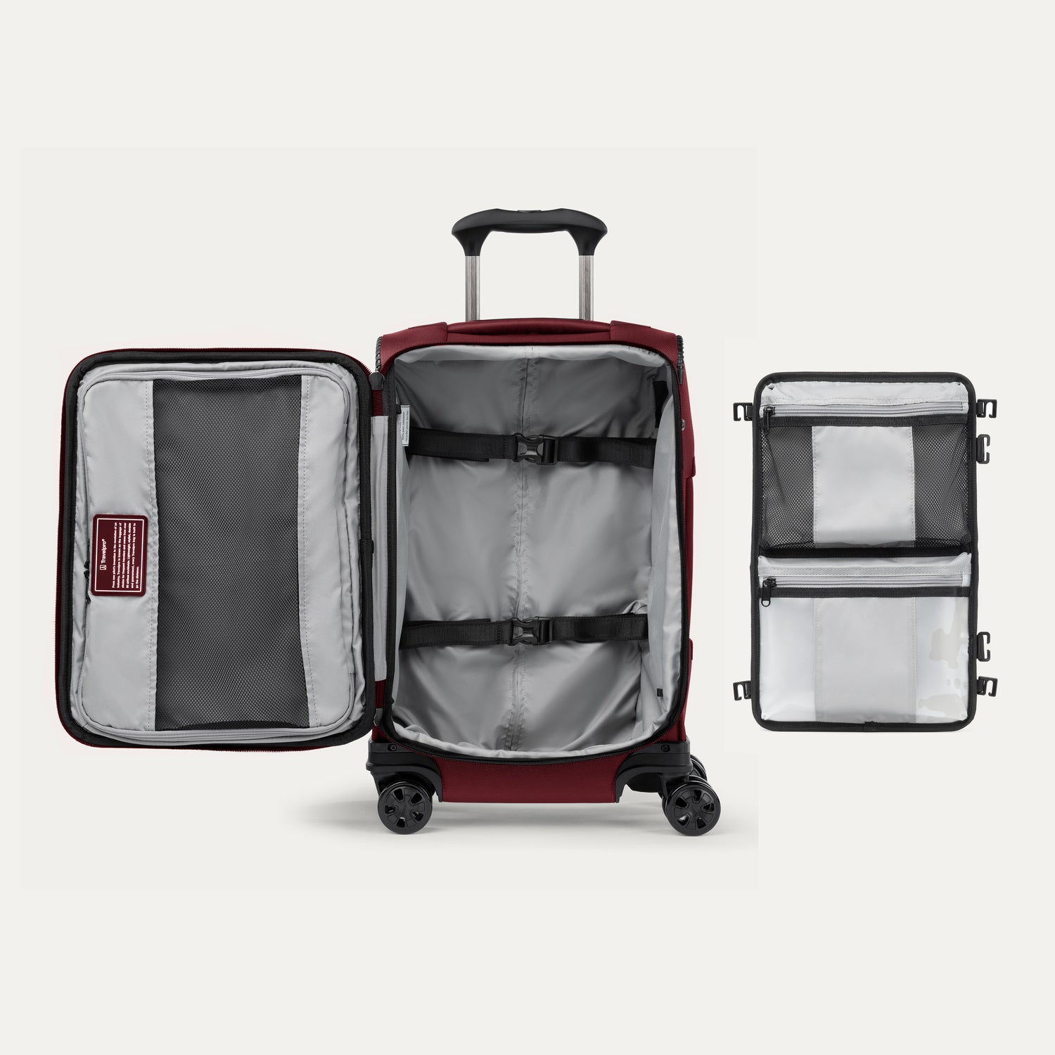 Open red suitcase featuring packing organizer on a white background