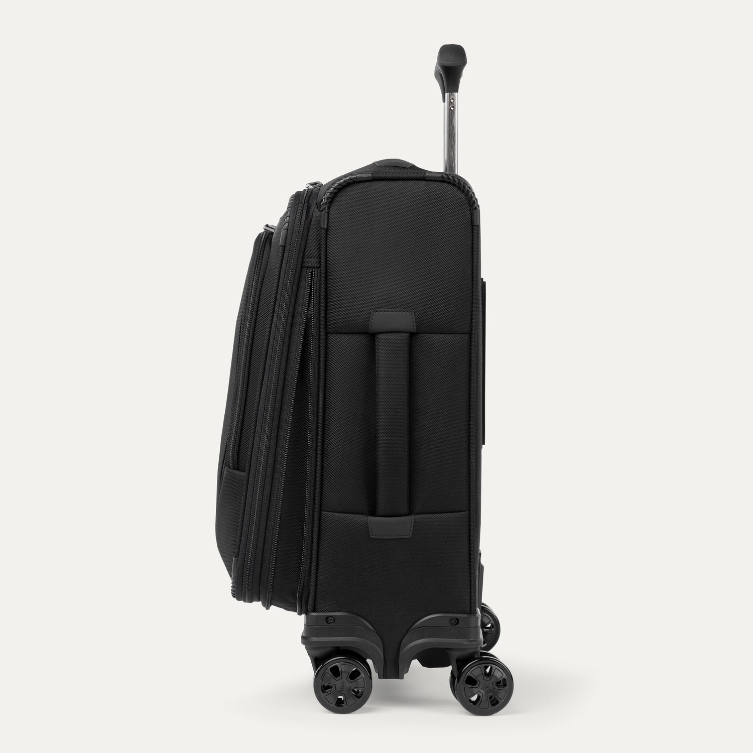 Side view of expanded black suitcase with black wheels and handle on a white background