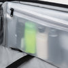 Clear pouch with toiletries, showing a close-up of the product arrangement.