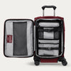 Interior view of the Crew™ Classic Carry-on Spinner in Rosewood Red, showcasing built-in accessory compartments and compression straps for organized packing.