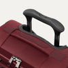 Close-up of the PowerScope Lite handle system and top carry handle on the Crew™ Classic Spinner in Rosewood Red.