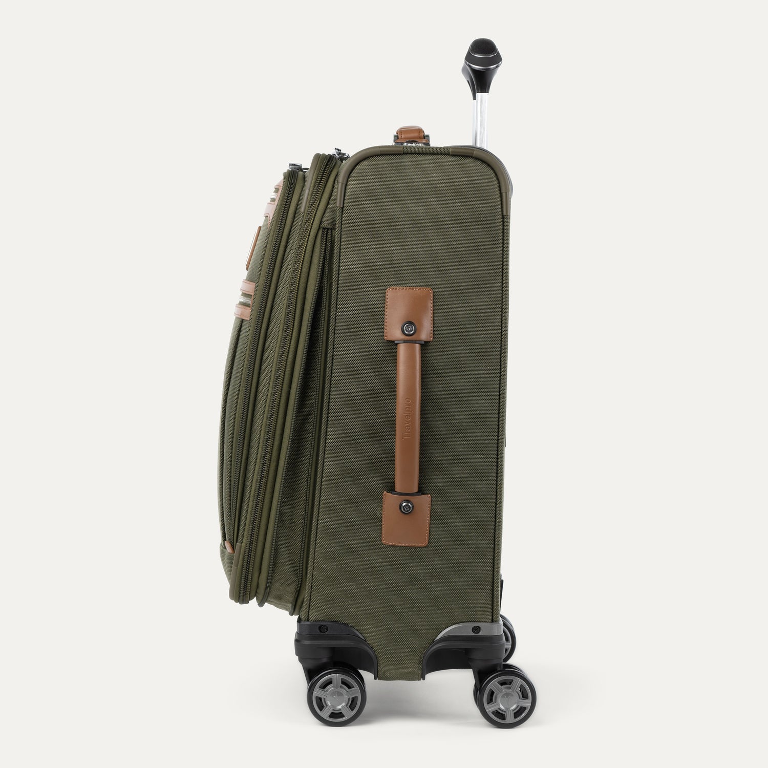 Side view of expanded green suitcase with handles and wheels on a white background