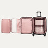 Open suitcase with open suiter compartment on a white background
