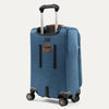 Blue suitcase with black wheels and handle on a white background
