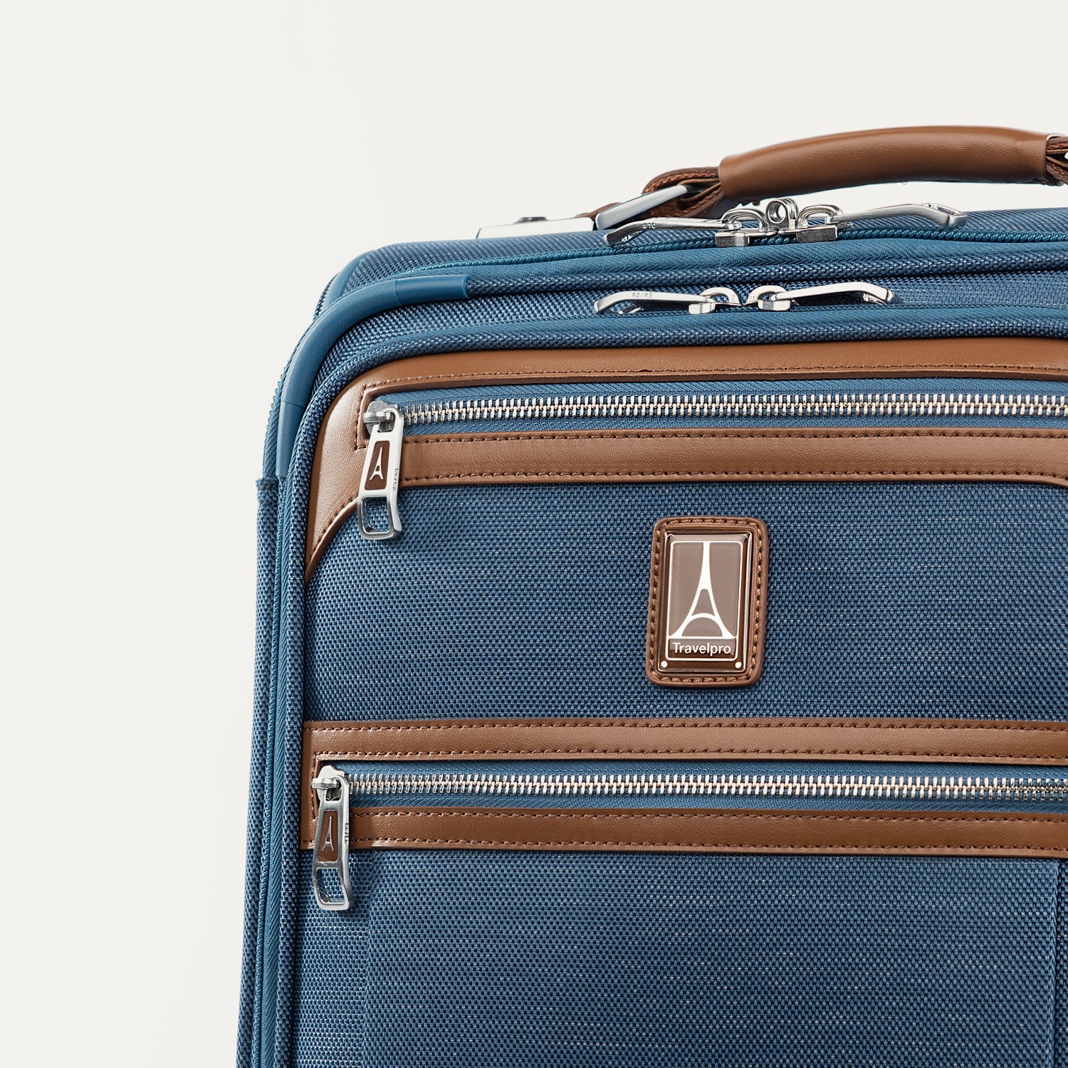 Blue suitcase with brown accents on a white background