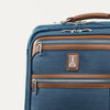 Blue suitcase with brown accents on a white background