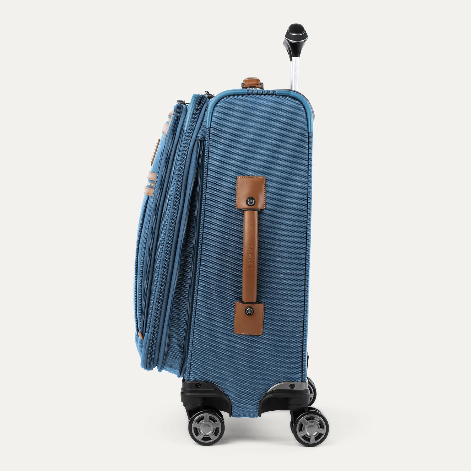 Blue suitcase with brown handle on a white background