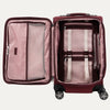 Open red suitcase with pink interior on a white background