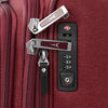 Close-up of a red suitcase with zipper combination lock.
