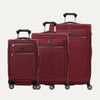 A set of three expandable spinner luggage bags in red color, including a carry-on size and two larger sizes, with chrome zippers and a leather accent on the front pocket.