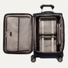 Open suitcase with interior organization panels on a plain background