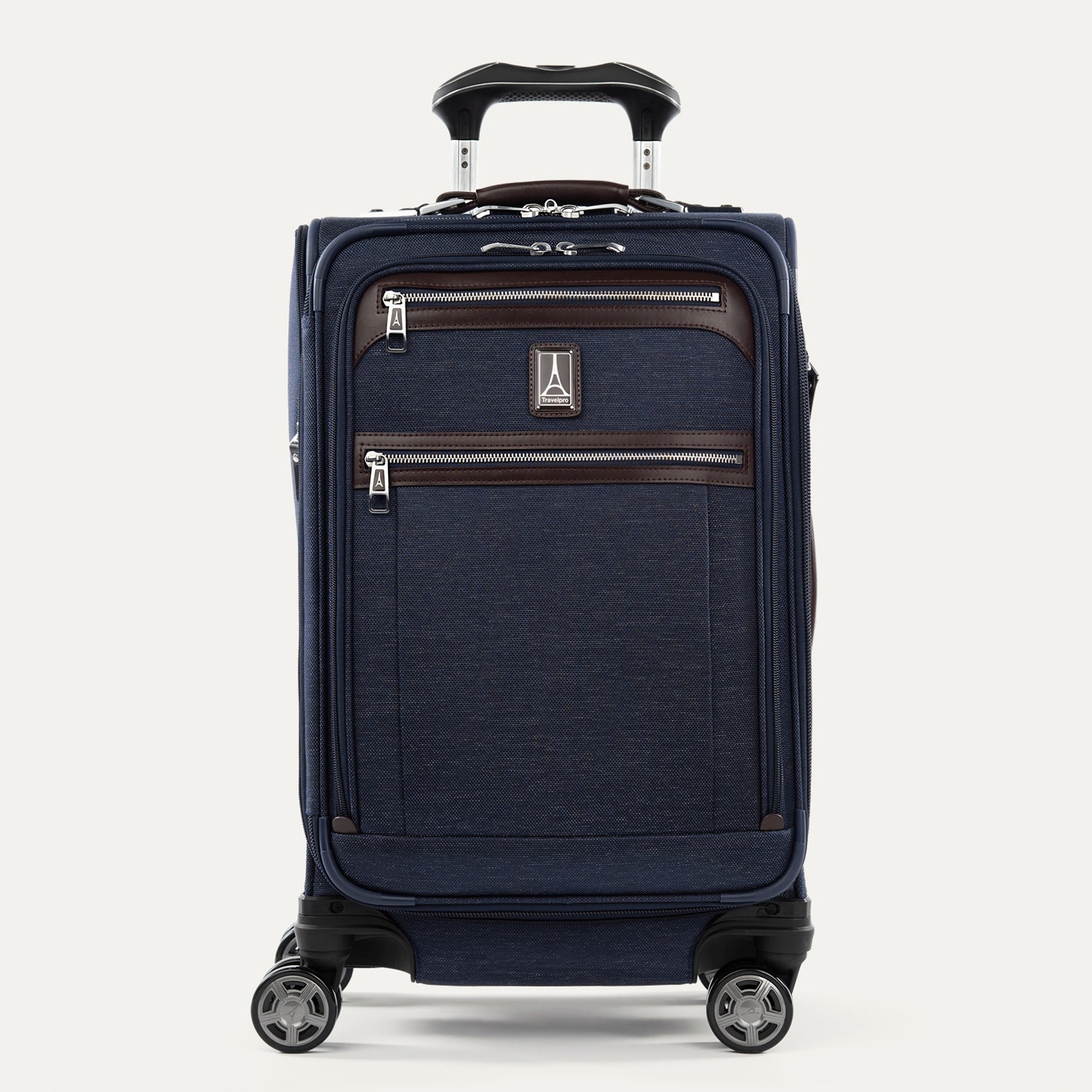 Front view of Travelpro Platinum Elite International Carry-On Spinner in True Navy, with leather-accented zippered pockets and PowerScope Extension Handle.