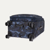 Slanted bottom view of Platinum® Elite Medium Check-In Spinner in Camouflage with smooth-rolling spinner wheels.