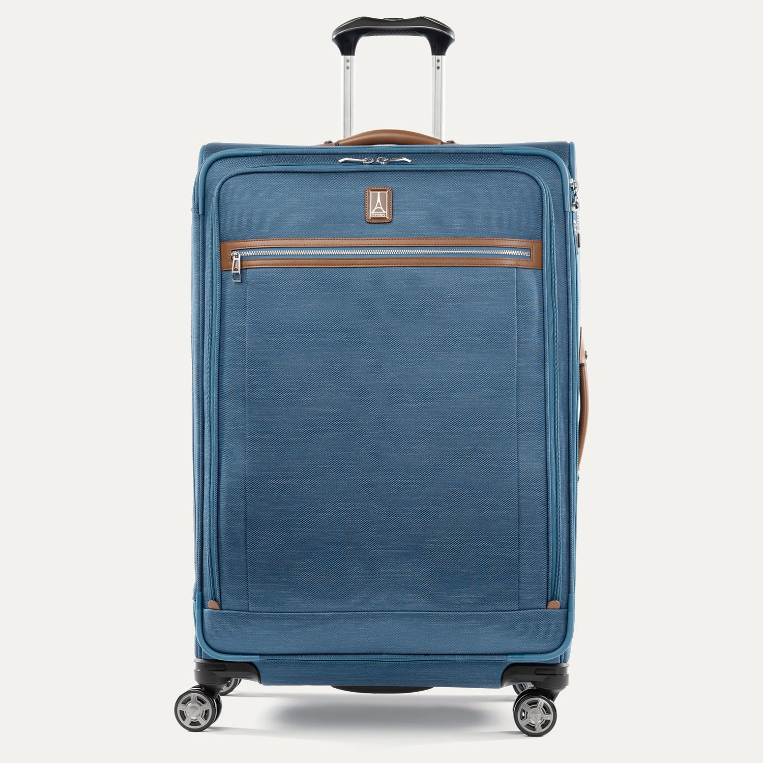 Front-facing Travelpro Platinum Elite Large Expandable Spinner in Coastal Blue, with leather-trimmed exterior zipper pocket.