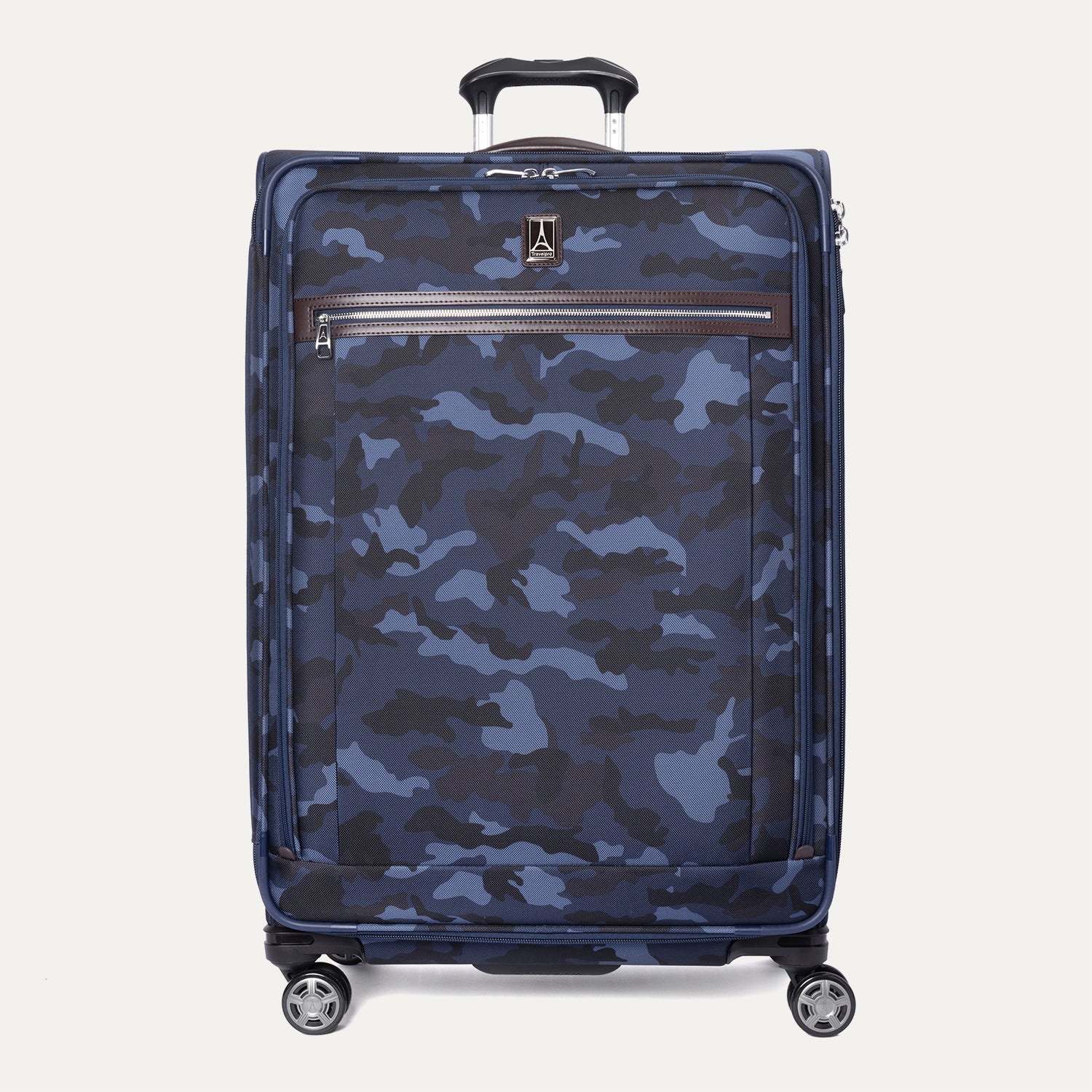 A large check-in spinner suitcase with a camouflaged pattern, featuring leather accents, chrome zippers, and a TSA-compliant lock.