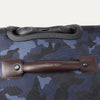 Close-up of top and leather carry handle on the Platinum® Elite Large Check-In Spinner in Camouflage.