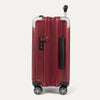Side view of red suitcase with combination lock on a white background