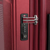 Close-up of a red suitcase's combination lock.