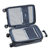 Open navy suitcase with black wheels on a white background