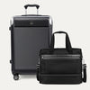 Black suitcase and duffel bag on a white background