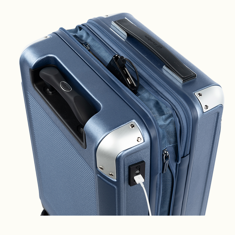 luggage showing USB cable plugged in to charge device