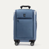 Front view of Travelpro Platinum Elite Compact Carry-On Business Plus Hardside Spinner in Dark Sky Blue, featuring a zippered front pocket and PowerScope Extension Handle.