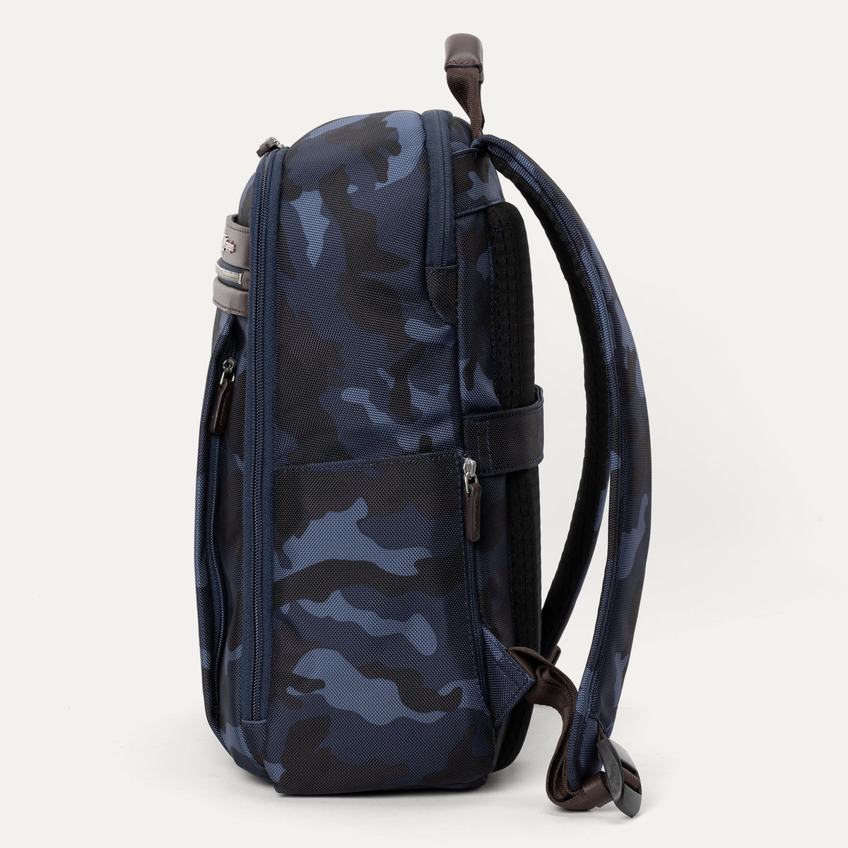 Side view of Travelpro Platinum Elite Slim Backpack in Navy Camouflage with zippered side pocket and padded shoulder strap.