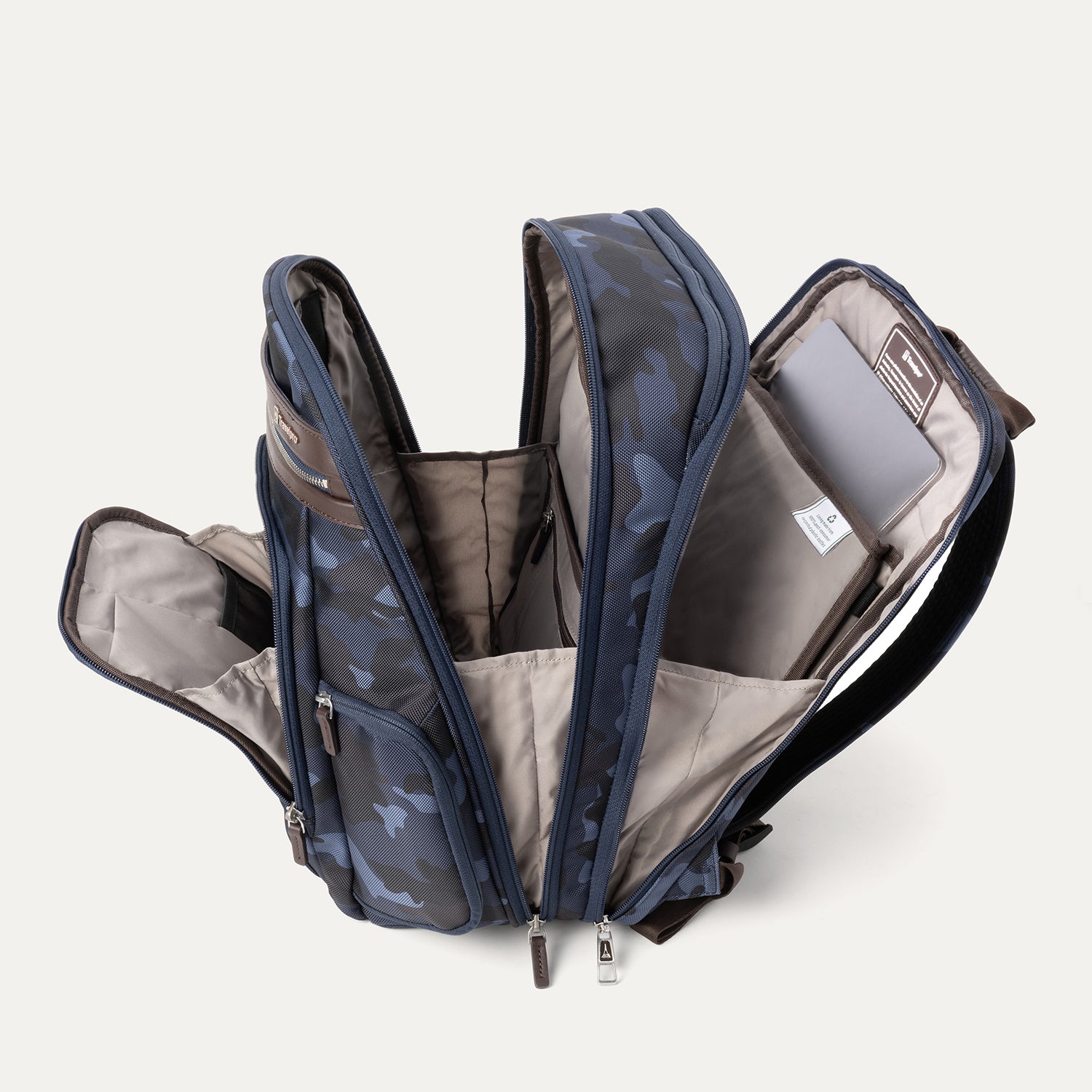 Interior view of Travelpro Platinum Elite Business Backpack in Camouflage, showing padded tech compartments and spacious organization.