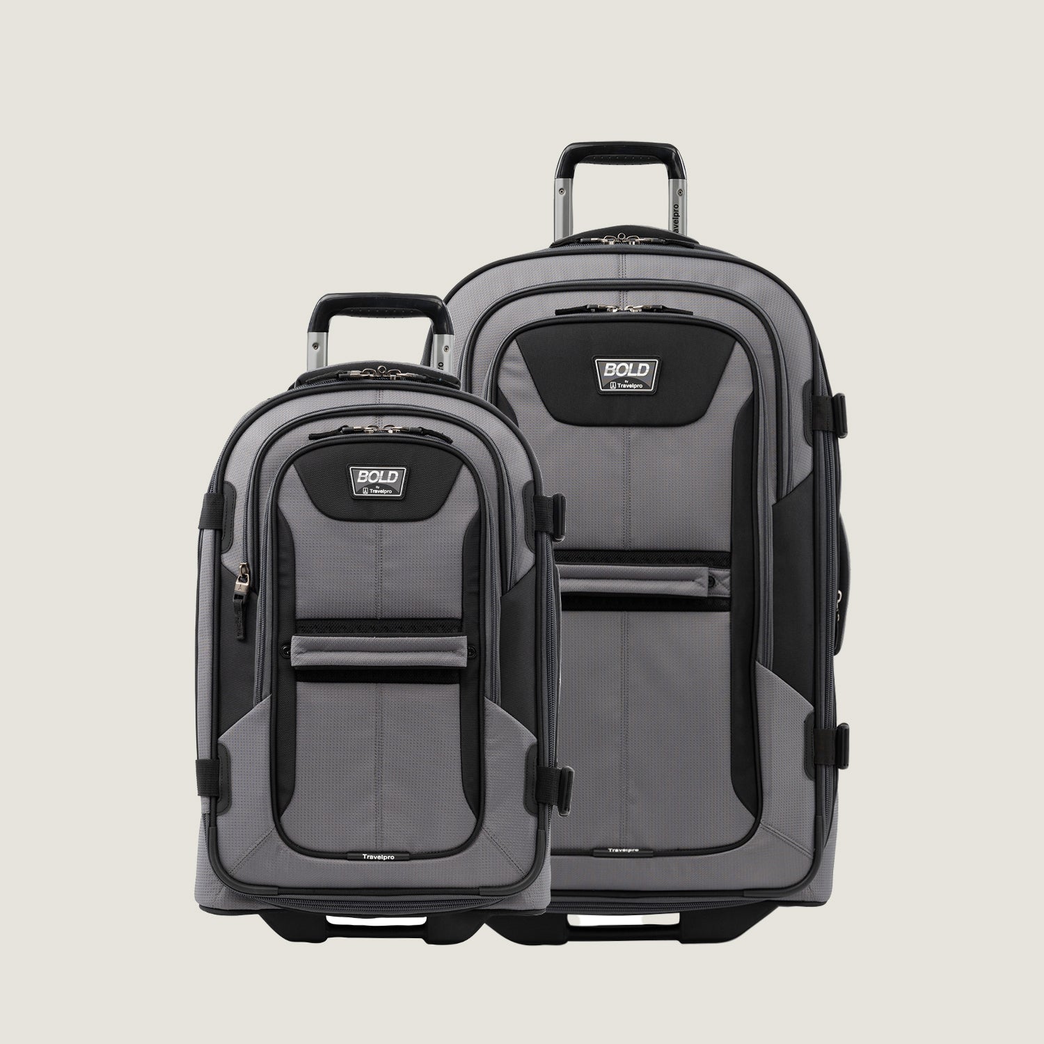 Gray and black Bold™ by Travelpro® Rollaboard® luggage set including a large check-in and a carry-on.