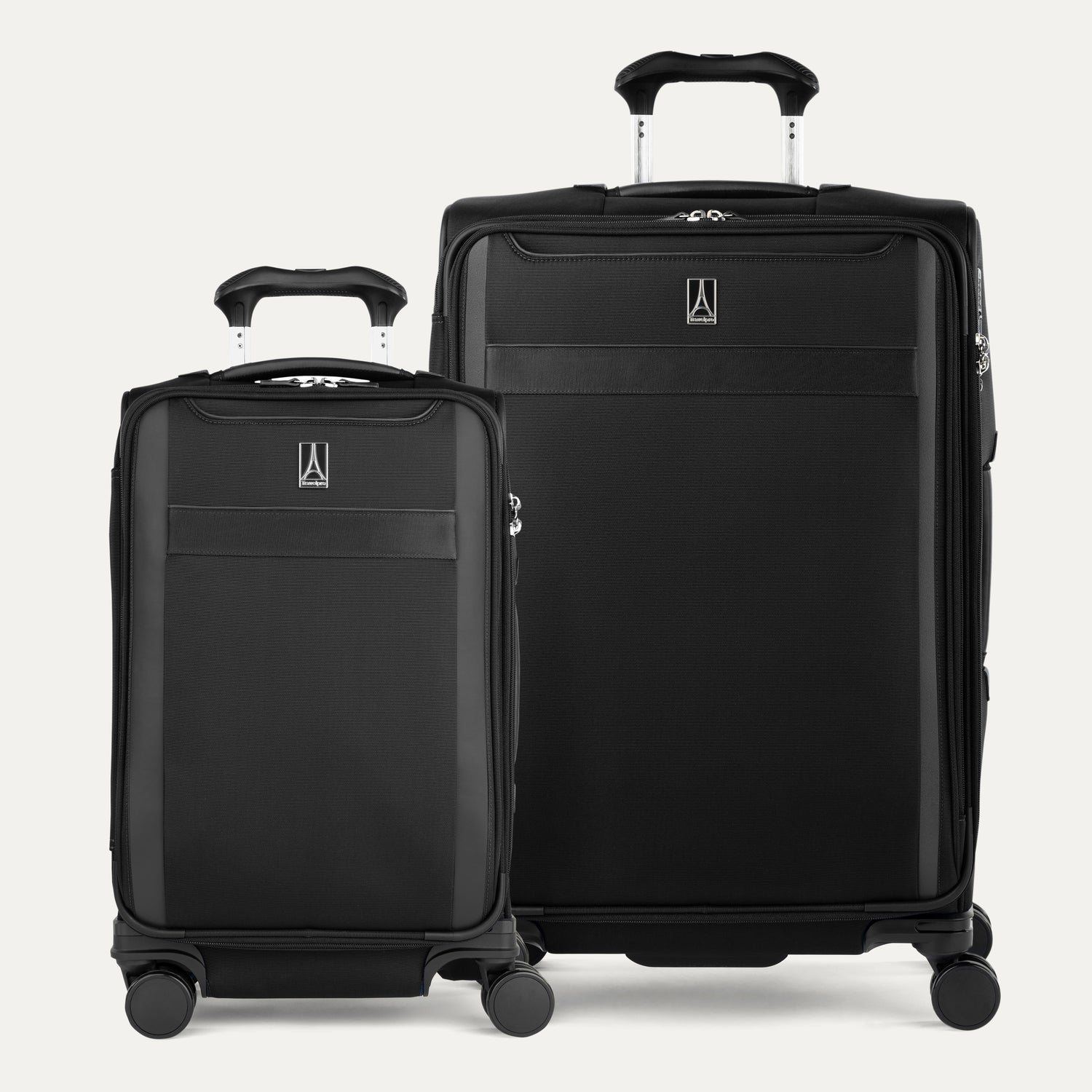 Two black suitcases of different sizes on a white background