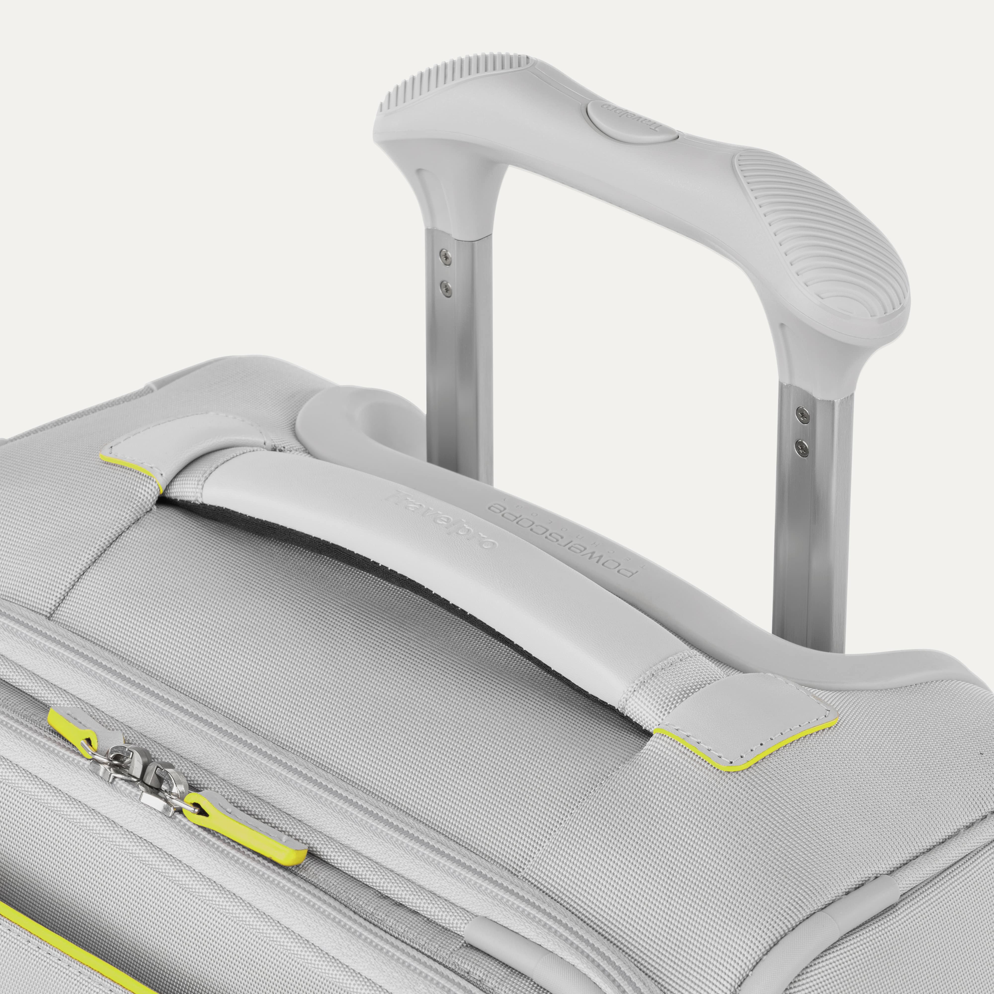 Gray suitcase with a handle and yellow accents on a white background