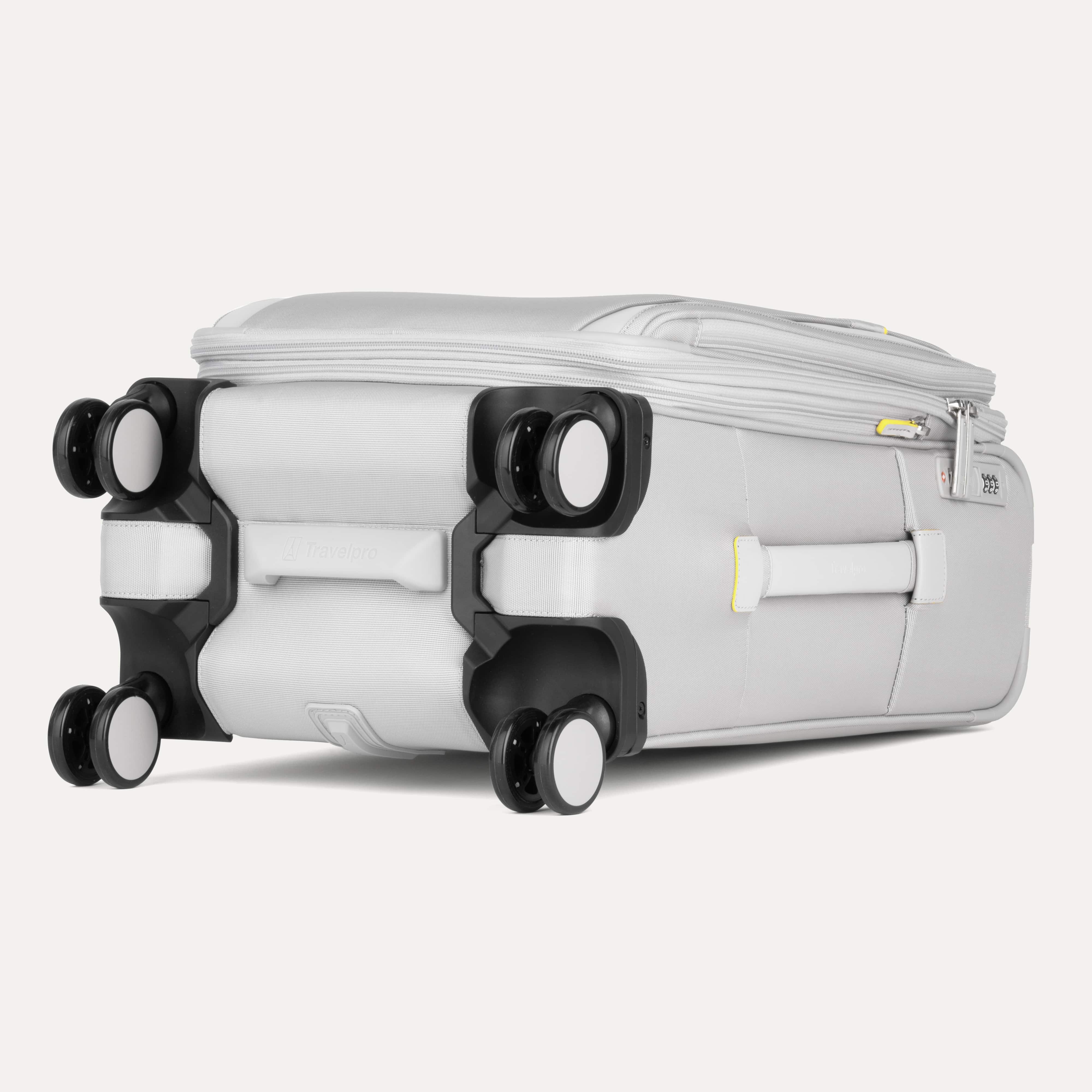 Gray suitcase with black wheels on a white background