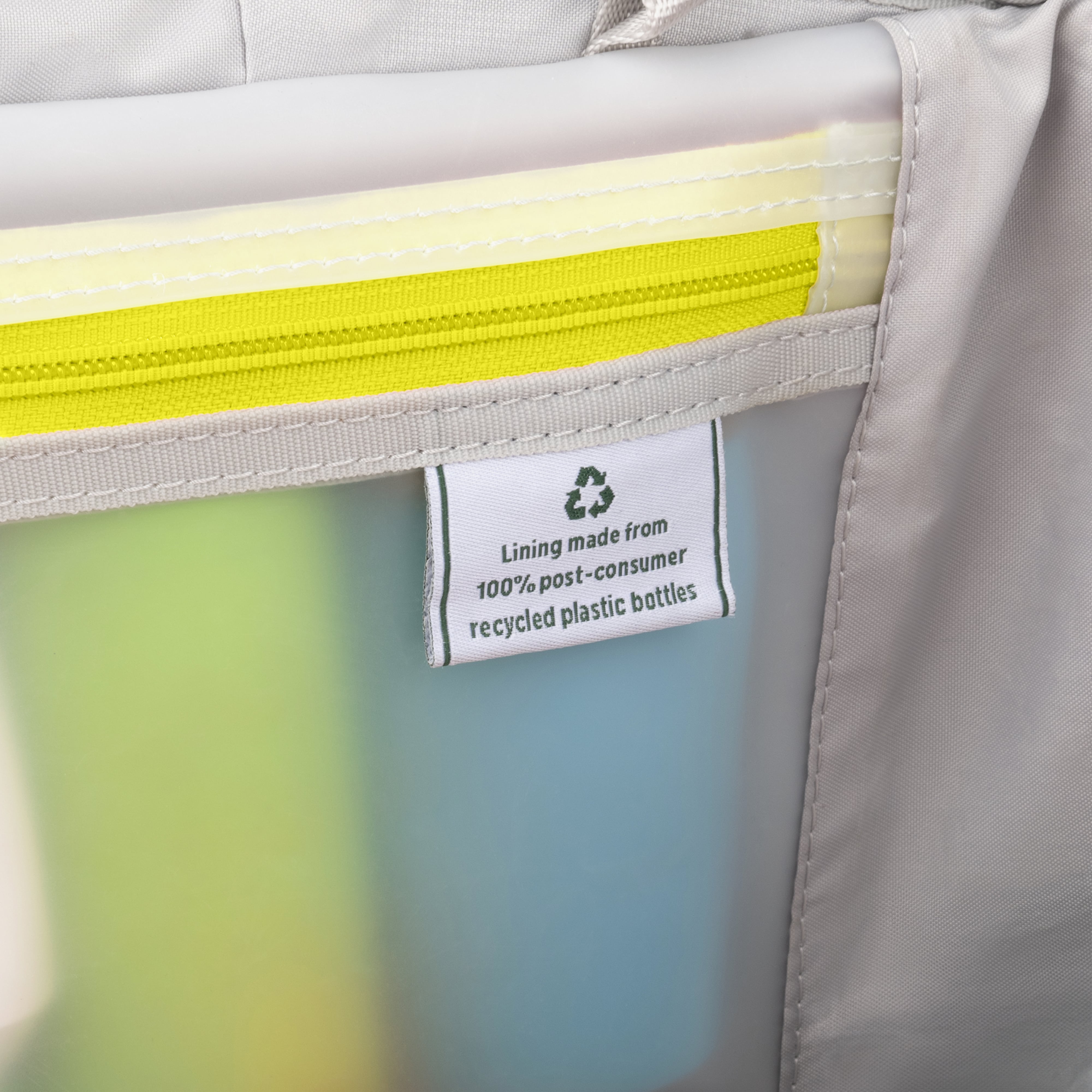 Recycled plastic bottle liner with a visible label on a product surface.