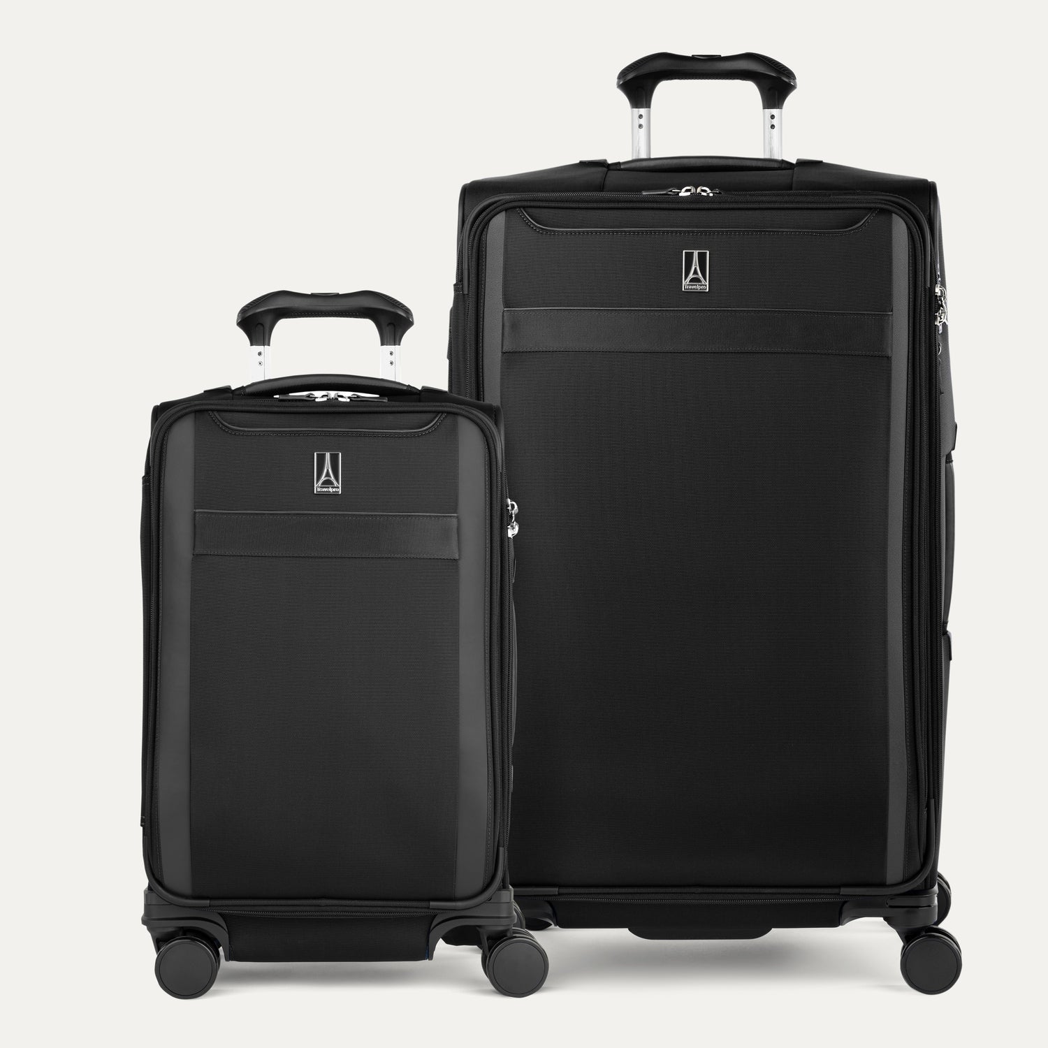 Two black suitcases of different sizes on a white background